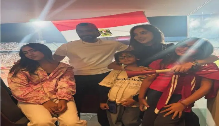 تامر حسني وبسمة بوسيل يخطفان الأنظار في استاد القا...