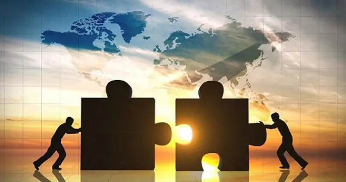 صفقات اندماج واستحواذ بـ 2.6 تريليون دولار في النص...