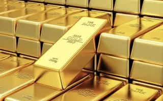 الذهب يبدد مكاسبه ويستقر مع صعود النفط