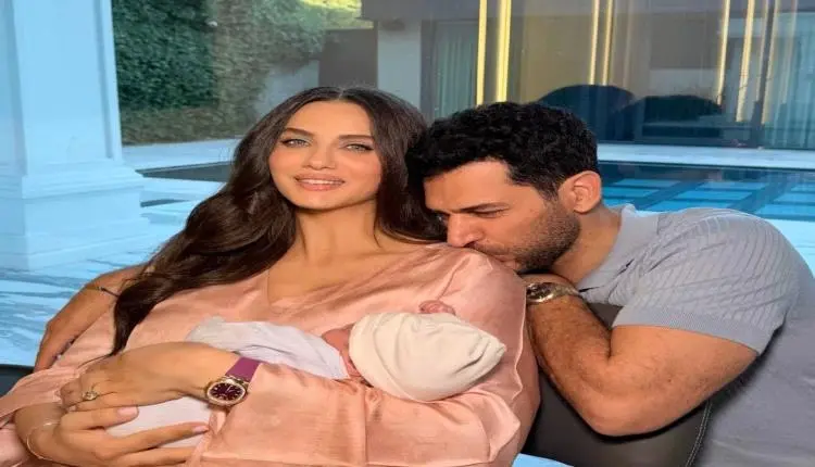 النجم التركي مراد يلدريم وزوجته إيمان الباني يعلنان قدوم مولودهما الثاني بصورة عفوية